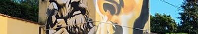 Pietrasanta: il volto di Michelangelo che dà forma al suo David, la street art di Rhd sulla cabina Enel